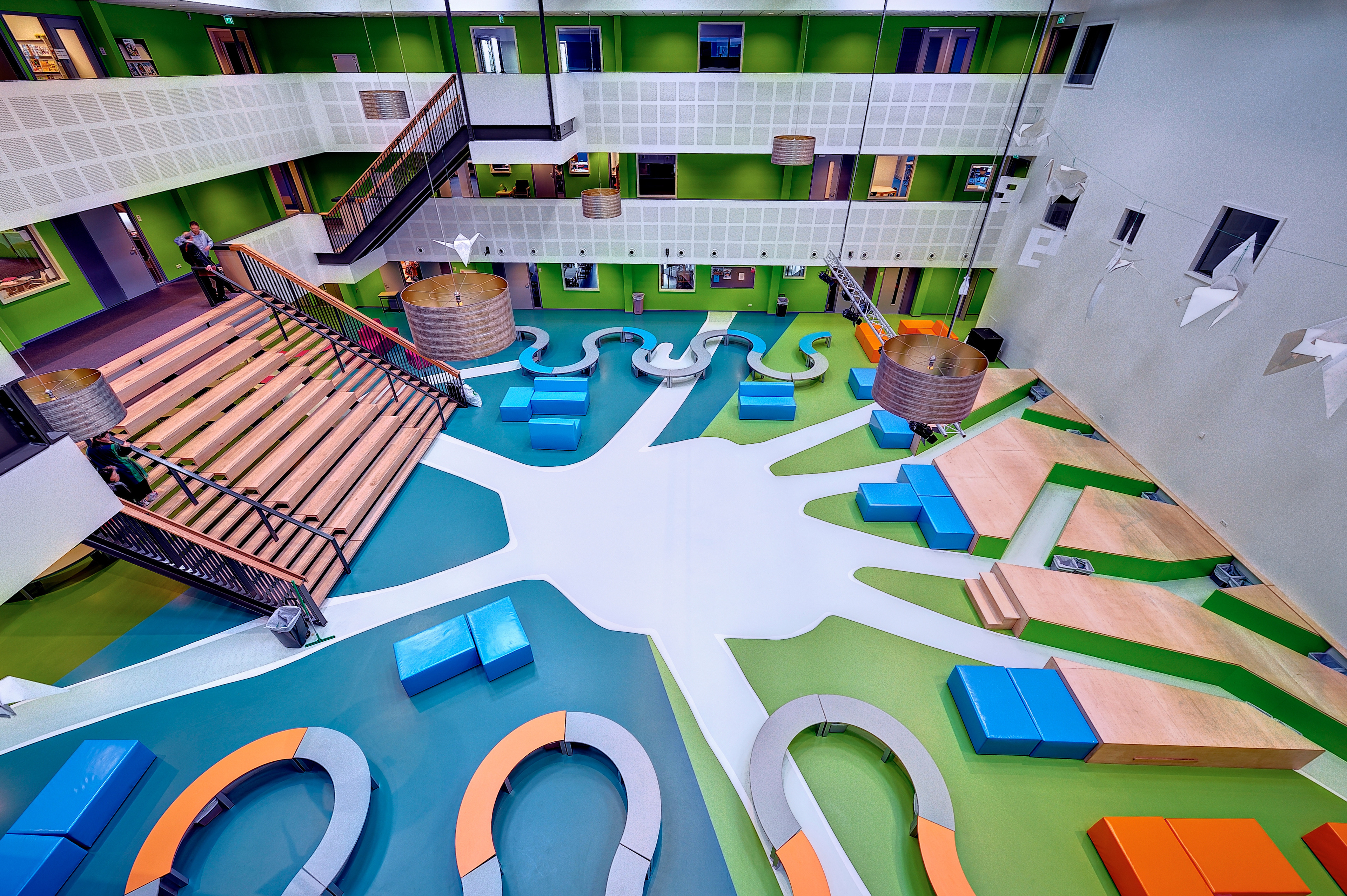 Sika ComfortFloor® blue and green floor at Revius Lyceum school lobby in Netherlands